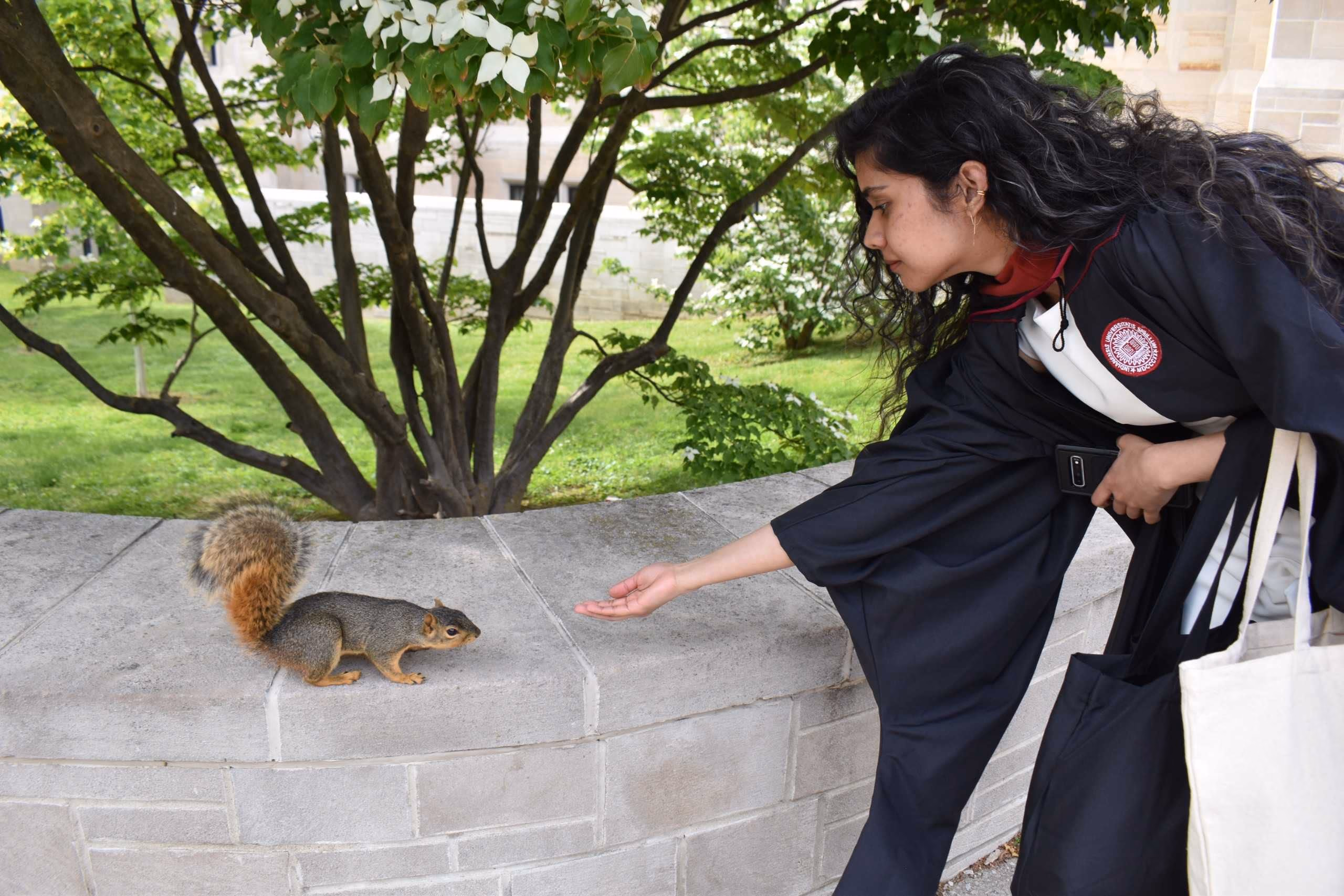 Graduation day moment with a squirrel